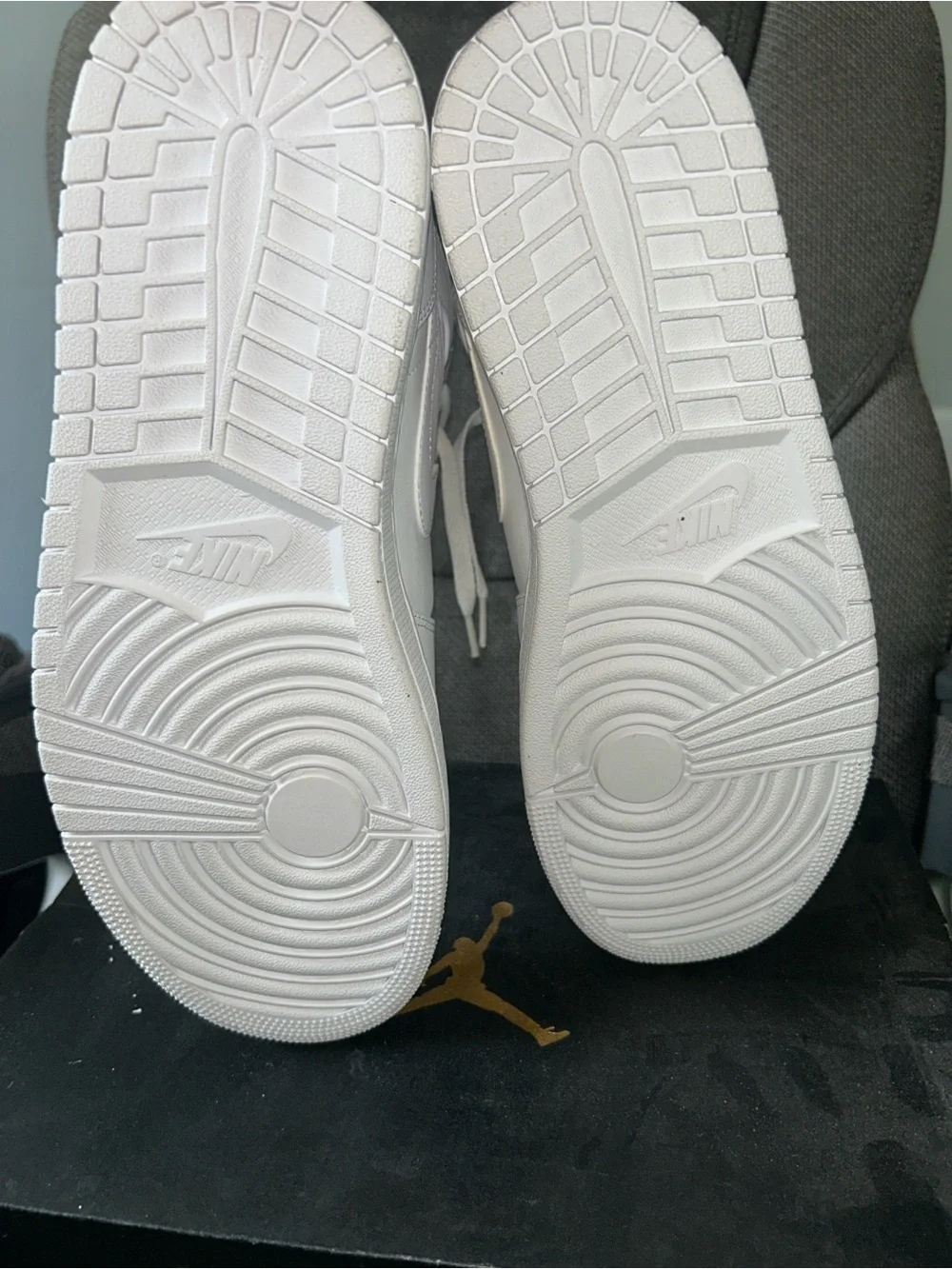 All white Air Jordan 1s mid